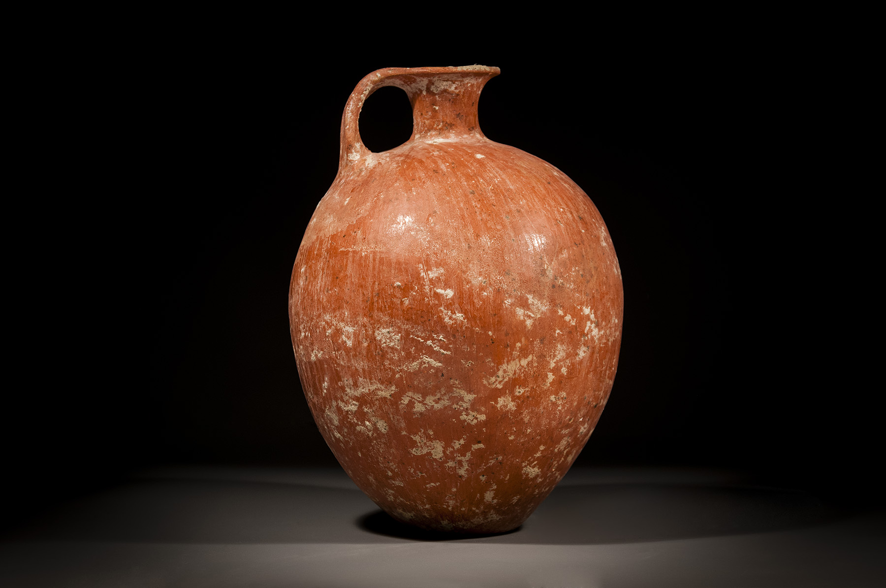 A Canaanite Large Red Slip Burnished Wine Jug